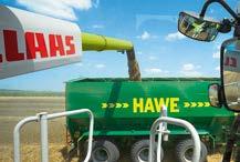 a colour display from the comfort of the cab: Grain tank discharge auger tube deployed: transfer process Grain