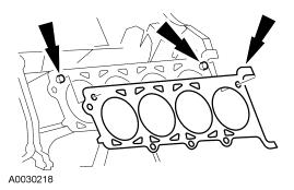 Page 11 of 41 Install the head gasket over the dowel pins. 19. CAUTION: Cylinder head machining or milling is not authorized by the Ford Motor Company. Cylinder head flatness must be within 0.