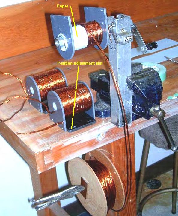 THE THREE COILS PRODUCED THIS WAY WERE THEN ATTACHED TO THE MAIN SURFACE OF THE DEVICE. THERE IS AN ADJUSTABLE GAP BETWEEN THE COILS AND THE ROTOR SO THAT THE OPTIMUM SPACING CAN BE FOUND.