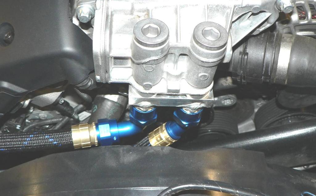 adapter block onto the oil filter thermostat housing as shown in figure 28. Fig: 28 30.