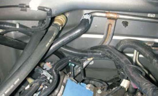 Remove the cut off air injection tube from the vehicle.