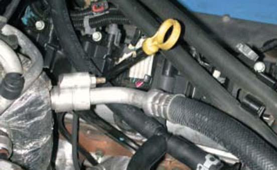 53. Route the modifi ed air injection hose assembly as show in the