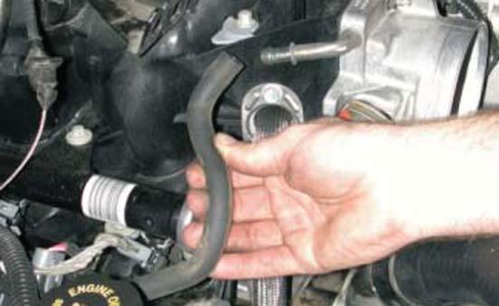Remove the (PCV) vent hose from the throttle body or intake manifold