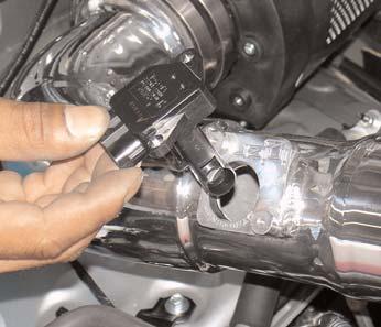 Figure 25 Once the breather hose has been properly installed over the 5/8 intake port, use