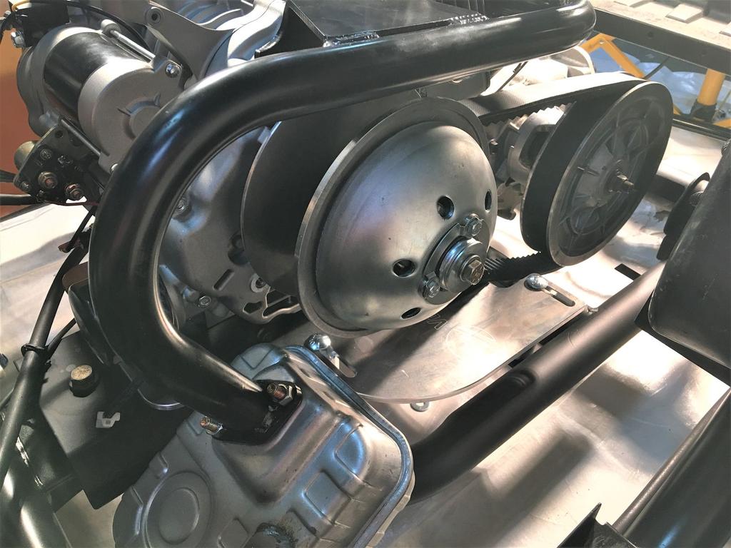 The centers of both clutches need to be lined up by moving the engine mount assembly side to side. There is no scientific way to do this other than with your eyes and possibly a straight edge.