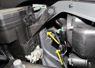 18. Run wire harness from driver s side fog light area towards the opening behind the headlamp.