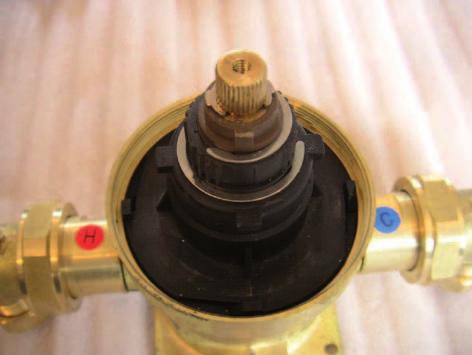 Before removal of the cartridge remember the position within the valve body.