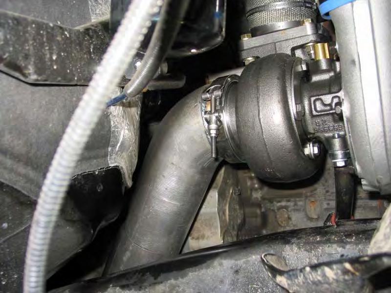 The other end of the charge air intercooler pipe should be connected to the intercooler utilizing the stock boot and stock clamps you saved earlier on. Re-use 2¾ straight boot with factory clamps. 43.