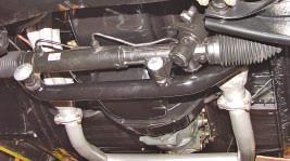 13a 13b 13c 13d Photos 10a & 10b: The rack and pinion crossmember bolts to the frame on the driver s