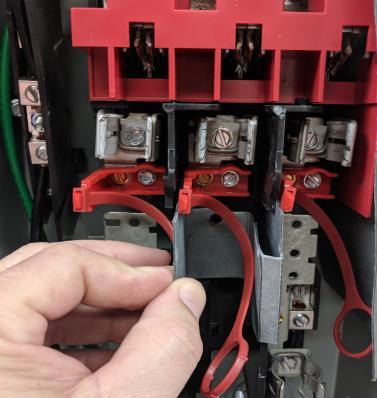 8 Remove insulator screw with 1/4" driver