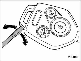 Keys and doors 2-11 To replace the battery: 1. Open the key head using a flat-head screwdriver. 3. Open the transmitter case by releasing the hooks. negative ( ) side facing up. 5.