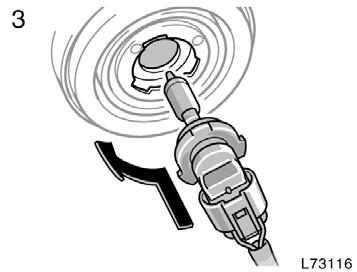 The above illustration shows the left hand headlight. 2. Unplug the connector while depressing the lock release.