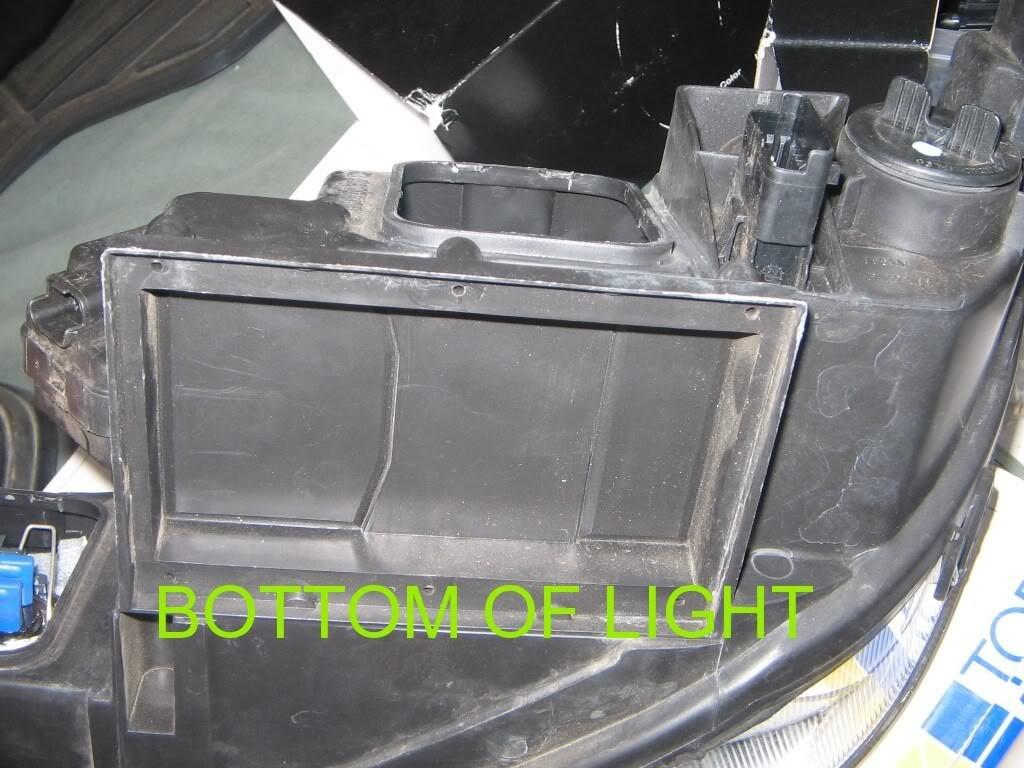 9. Replace the halogen bulb with the HID bulb and wiring.