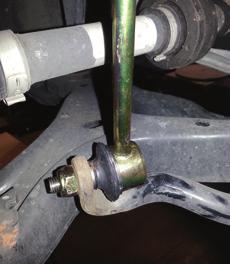 Reattach the brake line tab (Fig. 20) 