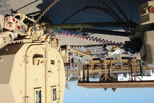 MRAP VEHICLES HANDBOOK Figure A-13: BAE-TVS Caiman connected to a U.S. Army heavy duty towbar Notes: (1) If using the MTVR towbar, it must be fully extended.