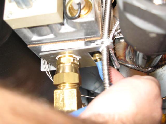 Unscrew and remove the gas supply plug with a 3/