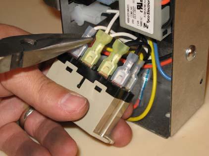 Remove all wires on the pump relay using needle-nose pliers.