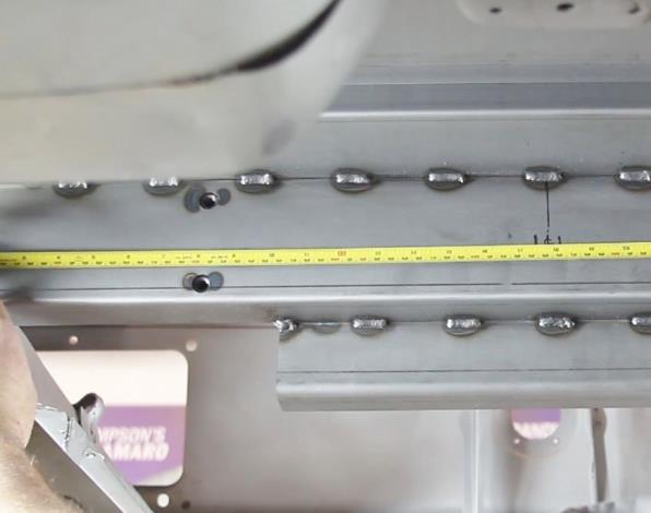 30. Measure between the inner frame rails to mark a centerline on the Sway bar crossmember (Figure 25).