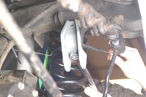 Install the new track rod bracket on the frame as shown in Photo 36 using the supplied 1/2 x 1 3/4 bolt, washer & nut in the