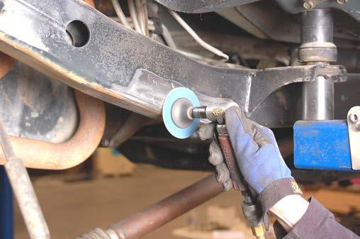 If equipped with ABS brakes, remove the sensor wires and clamps for the inside of the lower arms and save clamps for re-use. See Photo 2. PHOTO 1 PHOTO 2 Mark the location of eccentric bolt.