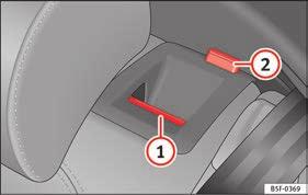 156 Folding the backrest forwards Place the side seat belts in the trim clip Fig. 153. Slide the head restraint(s) downwards page 153. Press the release lever Fig. 154 1 in the direction of the arrow.