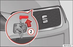 arrow until the lock is released. Fig. 8 Release lever in the driver's footwell area. Fig. 7 Luggage compartment: access to manual release.