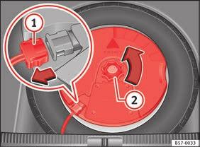 Extraction of the spare wheel in vehicles with SEAT SOUND 10 speakers (with subwoofer)* Fig. 256 In the luggage compartment: remove the subwoofer.