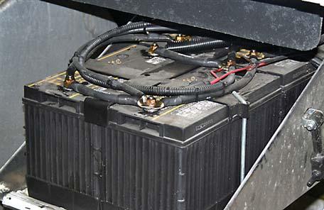 Vehicle Preparation Locate the vehicle battery compartment and remove the battery cover.