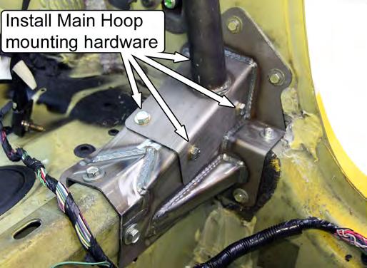 Place the Roll Bar into the vehicle so that the Rear Support Mounting Pads are resting on/near the MM Support Brackets and the Main Hoop Pads are on the floor pan. 70.