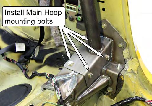 NOTE: In some cases, it may be necessary to enlarge the holes in the Main Hoop Mounting Pads to provide clearance for the mounting bolts. 32.