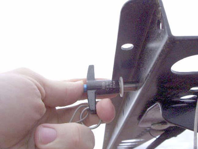 Installation Procedure 6. Remove the locking pin from the Roof Rail. See Figure 5-4.