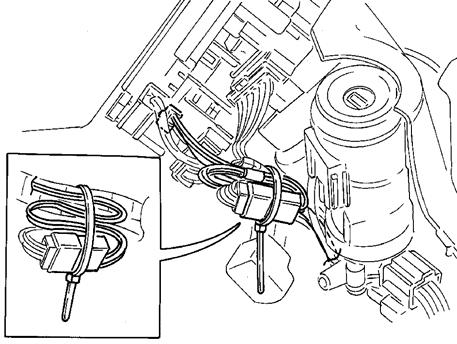 24. Locate and disconnect the black 12P connector from the steering column connector block. (Fig. C-17) 25. Connect the V3 harness' white 12P connector to the vehicle harness' black 12P connector.