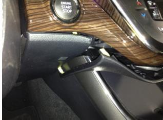 Disconnect the hood lock control lever.