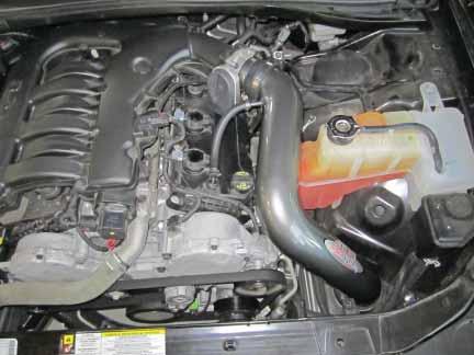 p. Install the supplied ½ ID hose between the crankcase vent on the head cover and