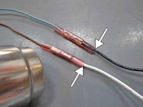 f. Strip the ends of the cut IAT wires near the throttle body. g.