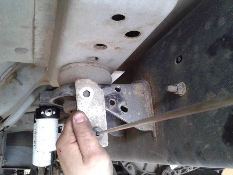 brake cable does not touch the bracket and does not touch the cross member mount ahead of the bracket.