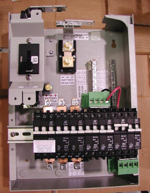 Apollo Solar Inverter Switchgear Module Installation Manual Rev 1.2 Page 15 The photo on the right shows the AC and DC circuit breakers installed on the ISM DIN rail.