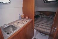 Galley Positioned on port side of the boat and in the front of the cabin SS sink and faucet Two burner hob and gas