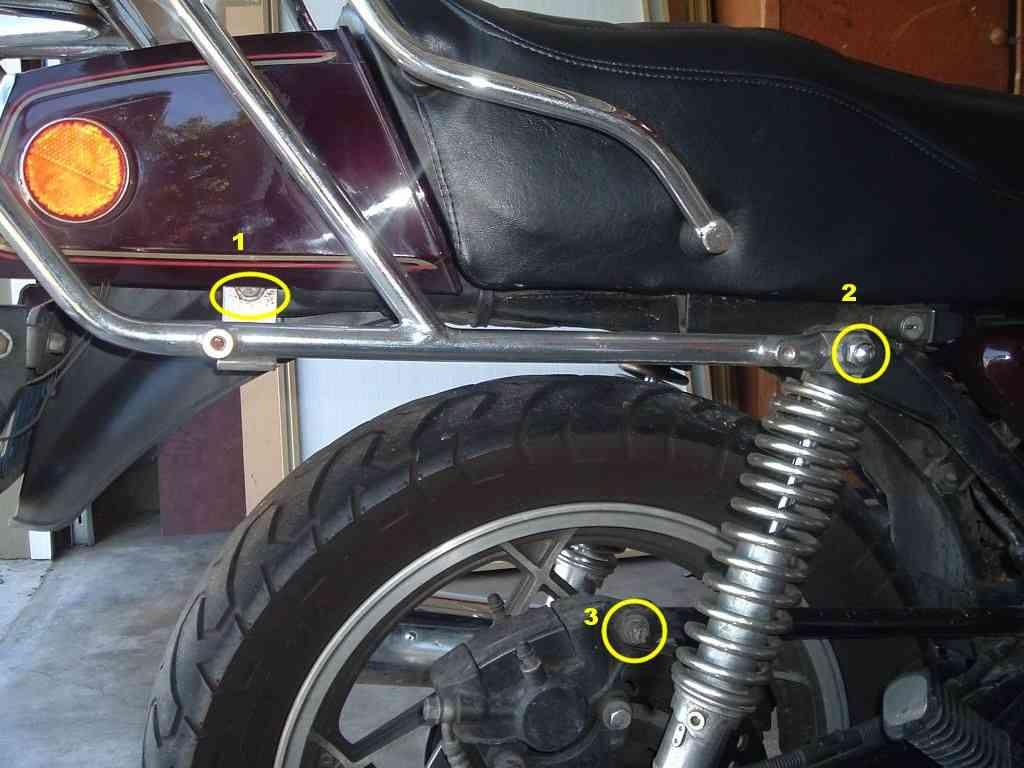 My bike has a luggage carrier which uses the rear chassis bolts (#1 usually the rear turn signal mounts).
