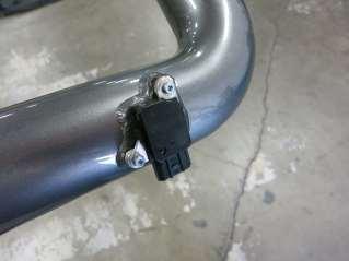 f. Install the intake tube by inser the bracket to