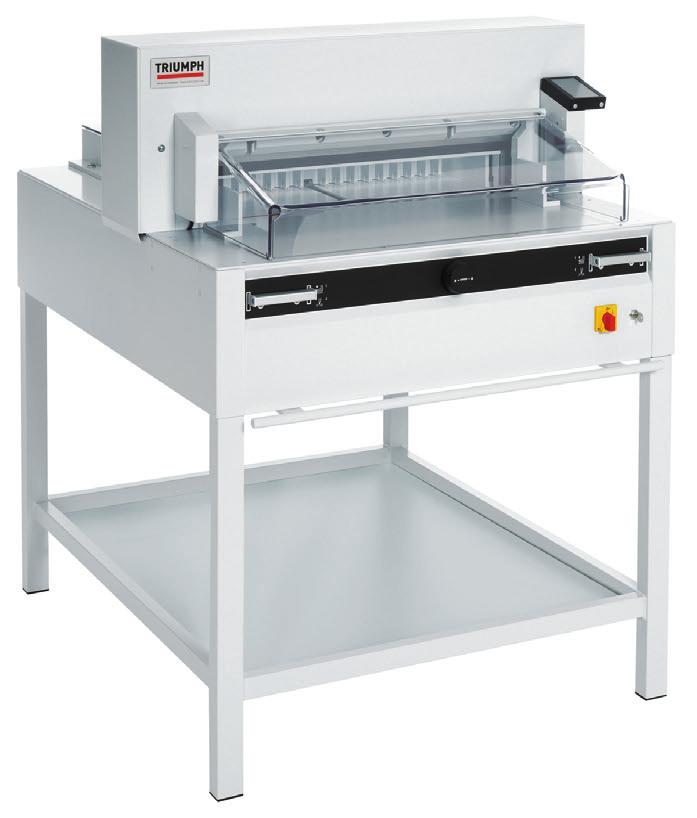 TRIUMPH 5560 Programmable cutter with hydraulic blade and clamp drive, power back gauge, 7-inch digital touchpad, and IR safety curtain on front table. Bright, LED optical cutting line.