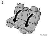 Head restraints 13A002 2. Pull up the lock release button and fold the seatback down. Each seatback may be folded separately.
