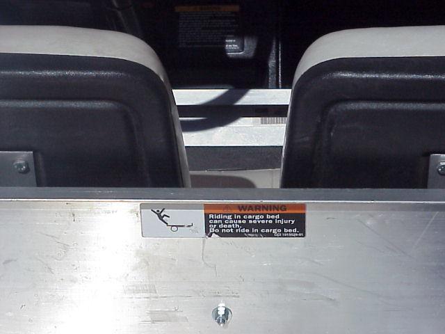 WARNING: Riding in cargo bed is very