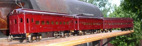 Editor s Note: This is a story of an obscure company from the late 20 s and early 30 s that took IVES Standard Gauge car bodies and roofs, welded them together, then added a modified Lionel O gauge