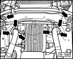Disconnect exhaust pipes from exhaust manifolds (three bolts on each pipe, arrows). Remove both front bolts from engine crossmember (arrows, top).