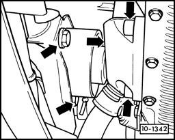 Disconnect engine to body ground strap (arrow, top left).