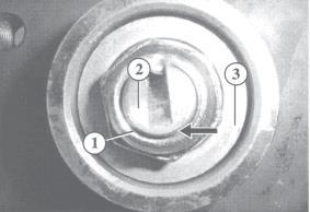 tools). Stake the collar of the nut into the groove on the stub axle. End play of 0.05 mm is permitted.