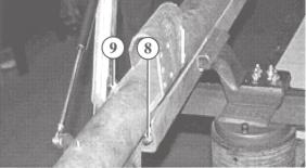 Unscrew the brake rod from the rod end fitting (3) Pull the bellows (4) off the rear attachment bolt (5) Unscrew the nuts (6) of the