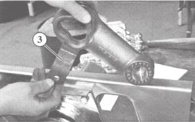 If necessary, use pliers - On forged swinging arms: Weld the damper mounting lugs (3) to the swinging arm Depending on the frame design, the damper screw is fitted on the out side or inside of the