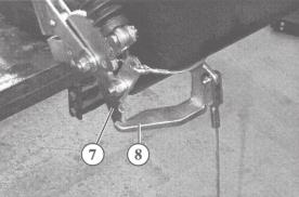 3.16Installing the handbrake lever Fit the handbrake lever (1) onto the pivot bolt (2) Insert the securing bracket (3) into the slot (4) on the housing Fit and tighten the self-locking nut (5) with